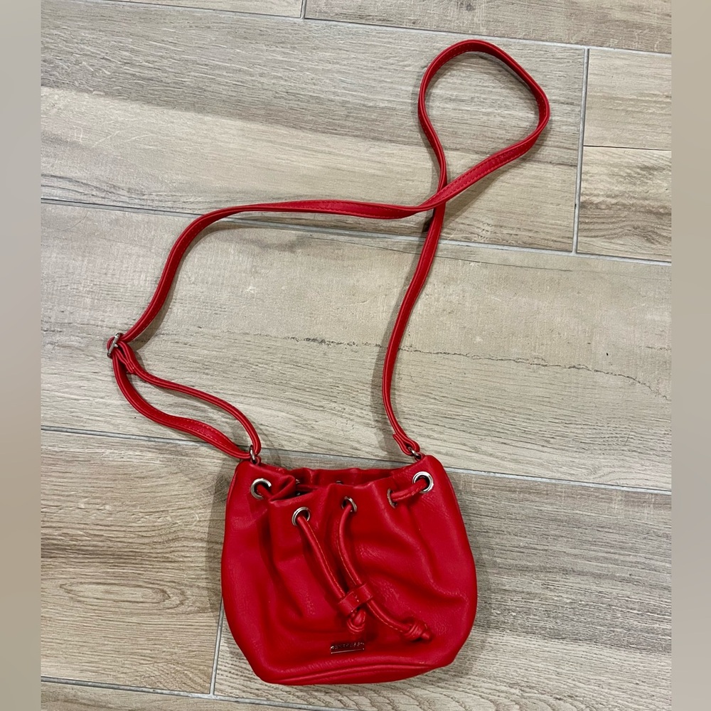 Never Used: Mini Express Crossbody Bucket Bag in Red